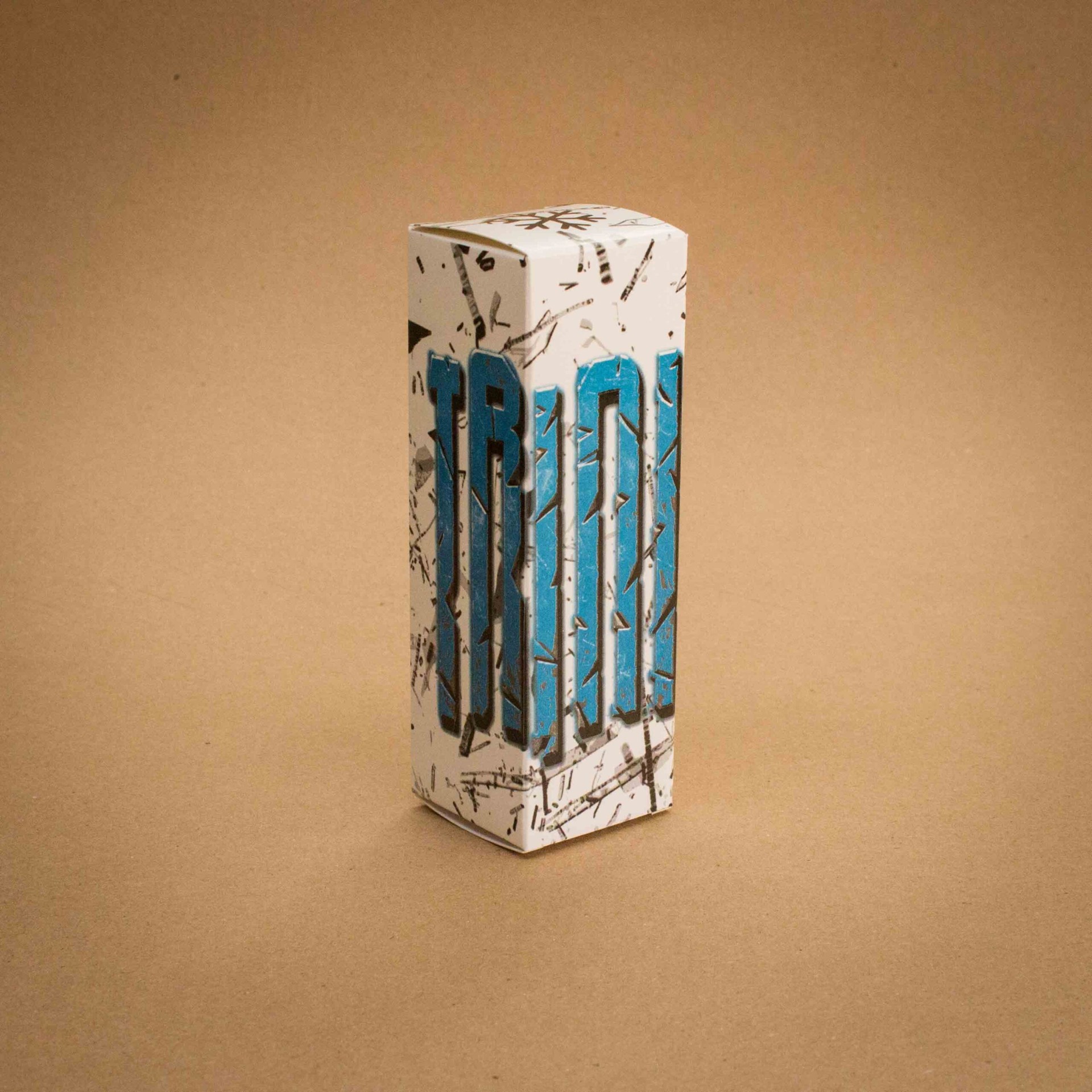 TRON vape juice folding carton with shattered ice graphic and blue letterpress typography