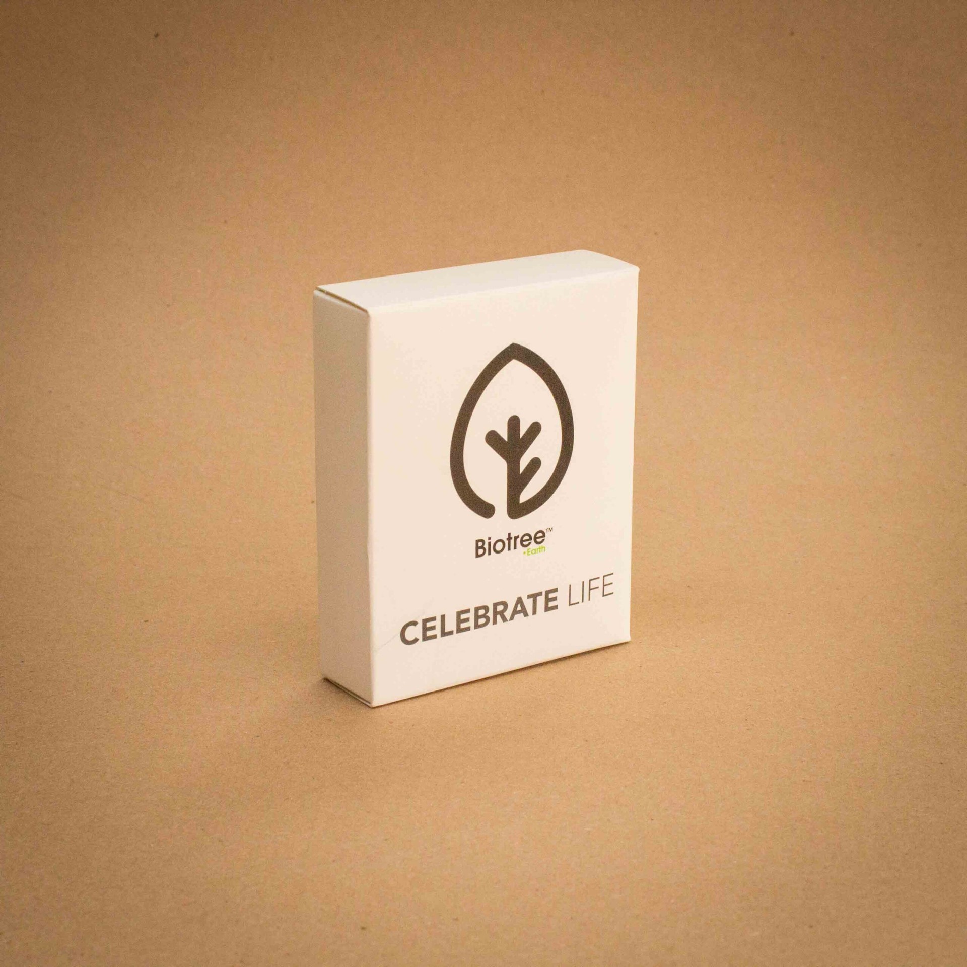 Biotree Celebrate Life minimalist white folding carton
