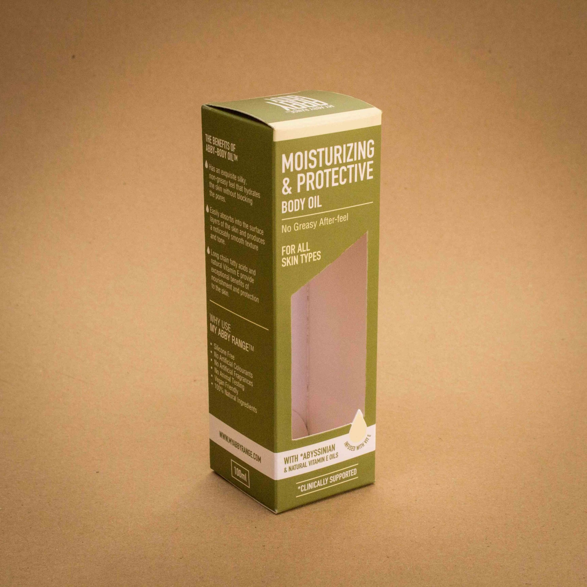 My Abby Range moisturizing and protective body oil folding carton in olive green with window patch